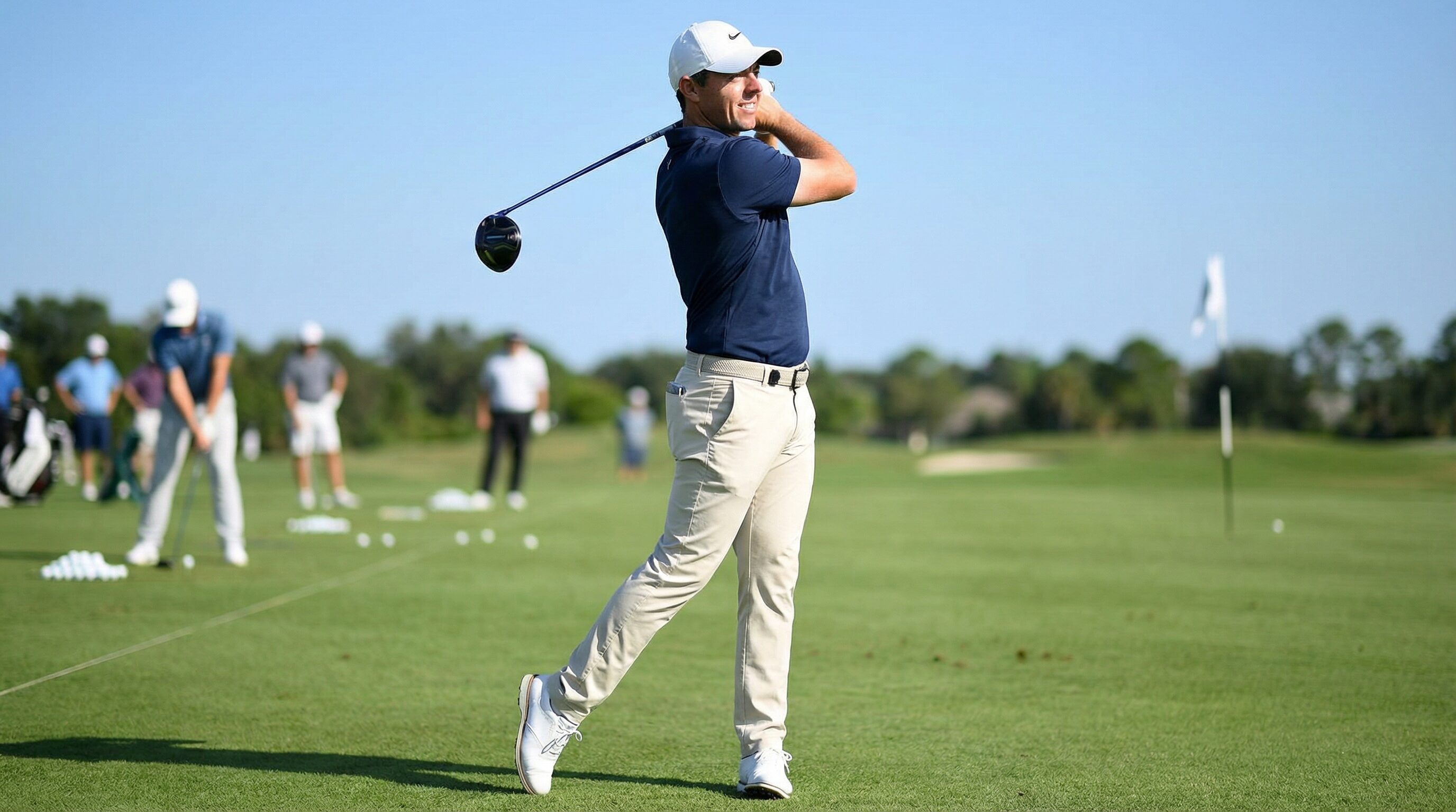 A golfer demonstrating a smooth, balanced finish position, holding the pose confidently.