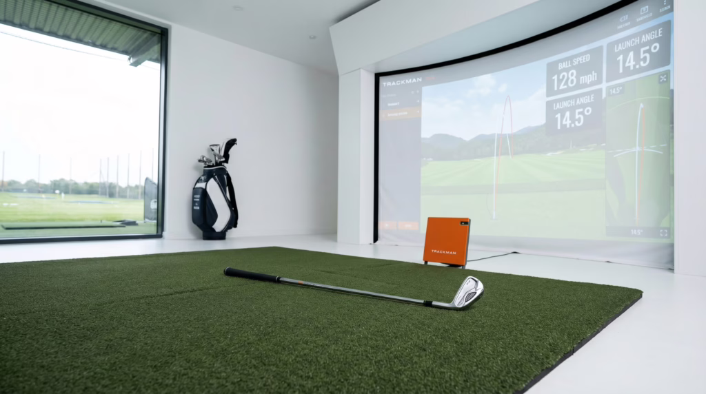 golf iron testing on launch monitor at modern indoor golf fitting studio