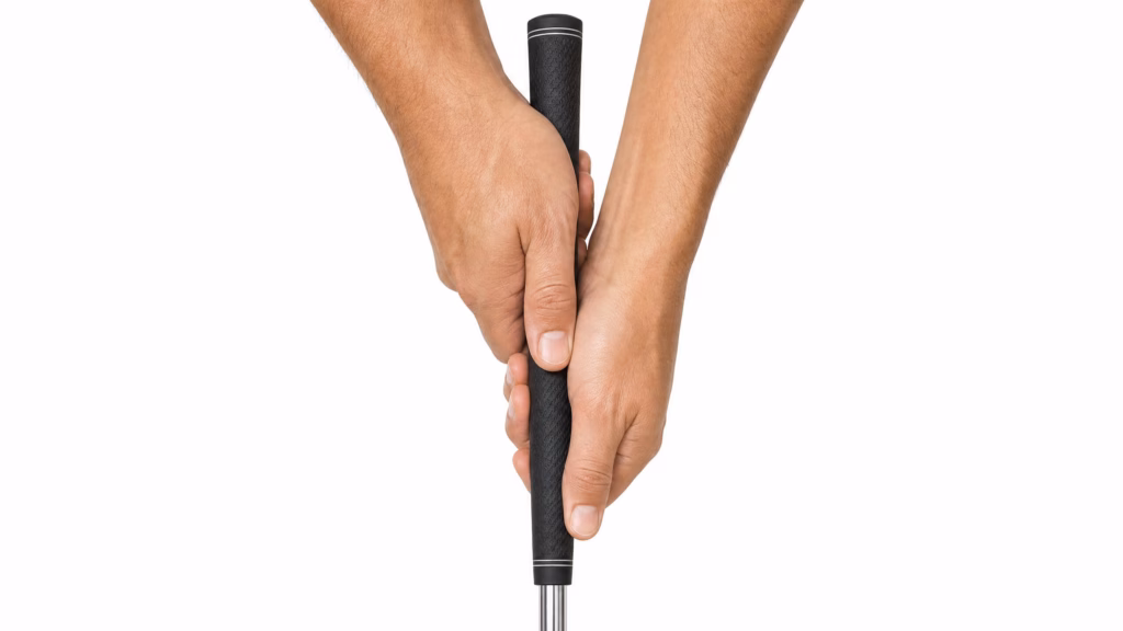 cross-handed left hand low putting grip