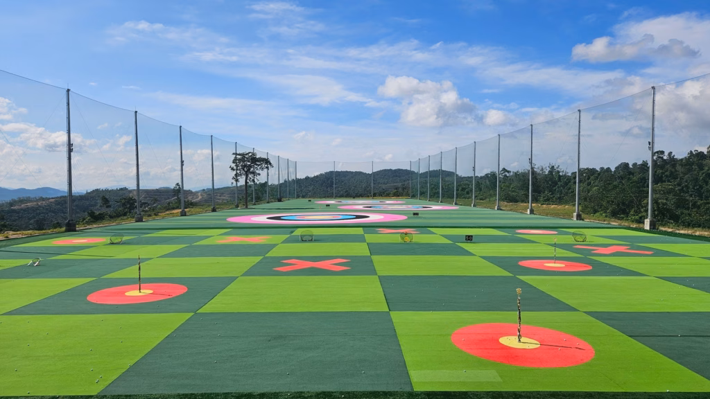 Colorful golf range targets for deliberate club-selection practice in match play strategy.