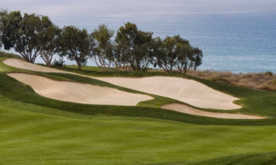 Risk management golf strategy on a golf course with water and bunkers in play.