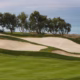 Risk management golf strategy on a golf course with water and bunkers in play.